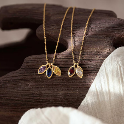 Blomblads­halsband med födelsesten